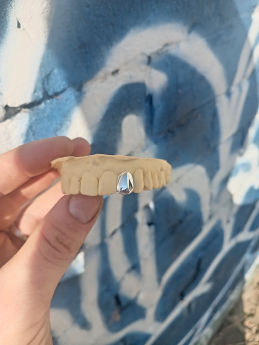 Solid silver cap grillz