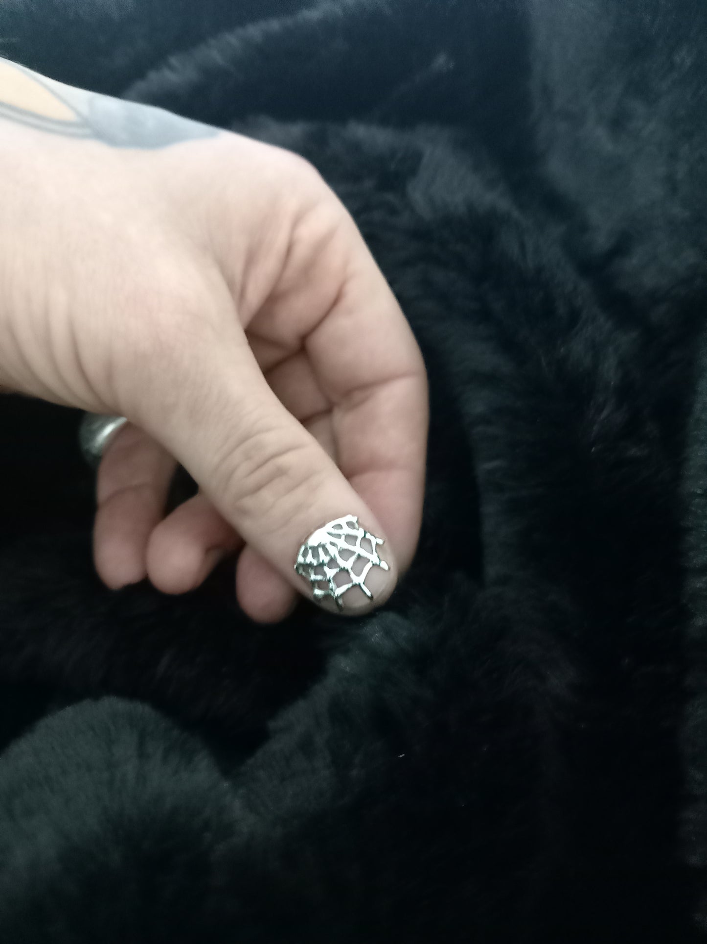 Custom made spider web nails
